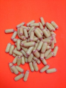 Bullets White chocolate coated raspberry licorice